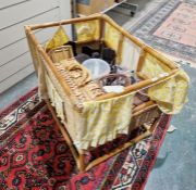 Open topped cane basket/dolls house, with curtains, assorted dolls house furniture, a small suitcase