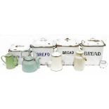 Four enamelled metal bread bins, an enamelled metal milk pail/churn and a teapot (6) Condition