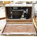 Vintage Singer sewing machine in wooden case, no.EA833584