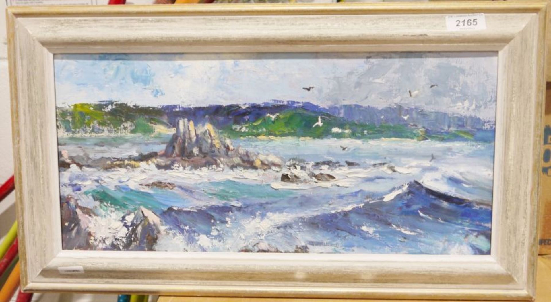 Morgan Hughes (20th century)  Oil on board Seascape with rocky outcrop, unsigned, 19cm x 41.2cm