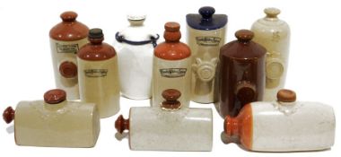 Quantity of stoneware hot water bottles to include examples by T. Smith & Co., Canal Potteries
