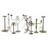Pair of metal candlesticks with welded chain link stems and further metal candlesticks and