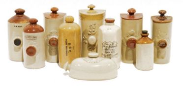 Quantity of stoneware hot water bottles to include examples by Timothy White & Taylors, Bourne