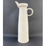 Julian Belmonte (b.1964) very tall tapered earthenware jug with cream glaze, impressed potter's mark