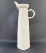 Julian Belmonte (b.1964) very tall tapered earthenware jug with cream glaze, impressed potter's mark