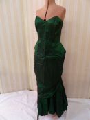 A green shot satin evening dress strapless boned bodice, a green velvet strapless full length dress,