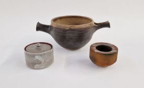 Andrew Niblett (contemporary) small raku fired pot decorated with three soft metal bars to top,