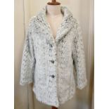 A faux fur fox 3/4 length jacket, an Isle faux fur 3/4 length coat, and three other faux fur
