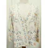 A 1920's silk jacket, embroidered in the Chinese style, cuffed sleeves, single button fastening,