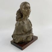 After Irena Sedlecka, resinous bust of Maria Callas on hardwood base, 28cm high