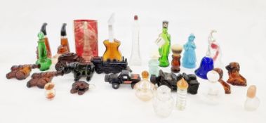 Two boxes of Avon novelty perfume bottles to include guitar, train, carriage, rhino, cannon, two