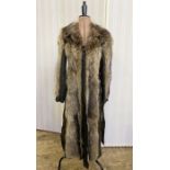 A vintage racoon and suede fur coat, quilted lining, suede tie belt, labelled TurkistukkOy, made
