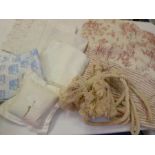 Large cream cotton curtain rope tie backs with full deep tassels, toile de jouy quilted cushion