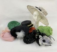 Various vintage hats to include green ruched chiffon with faux flowers, labelled 'Mitzi Boutique