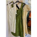 A Blanes vintage 1950's cocktail dress green figured satin, broad straps, a ruched bodice with a
