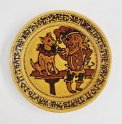 Mary Wondrausch (1923-2016) Large slip decorated charger/wall plate featuring Mr. Punch and his