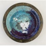 Studio pottery bowl, probably by Andrew Wilson, with flattened scroll over rim decorated with