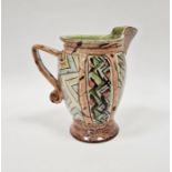 Paul Jackson studio pottery terracotta jug, a thrown and altered hexagonal body decorated with
