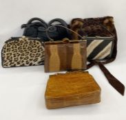 A selection of vintage handbags to include 1950's zebra fur and leather fixed frame bag, labelled '