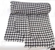 Length of black and white dog tooth pattern weave fabric with Batacchi & Gori Italy label, 5m