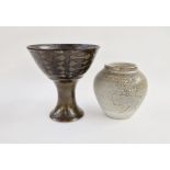 Large studio pottery bowl raised on tall stem of chalice form with stenciled oval decoration on