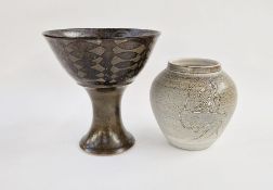 Large studio pottery bowl raised on tall stem of chalice form with stenciled oval decoration on