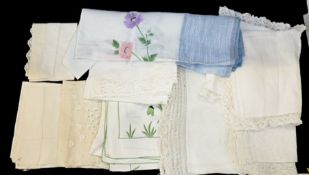 Quantity of table linen to include a large, fine crochet cloth, various tables clothes cut and drawn