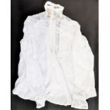 An Edwardian white cotton blouse, detailed with with lace on fine net, embroidered, pin-tucked and