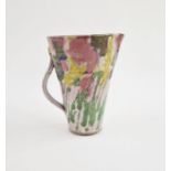 Janice Tchalenko (1942-2018) tapered stoneware jug with floral decoration on pink ground, height