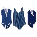 Three children's vintage swimsuits