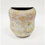 Chris Carter (b.1945) a stoneware vase of waisted ovoid form with textured surface covered in