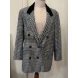 A Bromanta tweed jacket, lady's, waisted, with three wooden button fastenings, a black and white