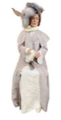 A fibreglass life-size mannequin/model of a seated woman in Edwardian dress, believed to have been