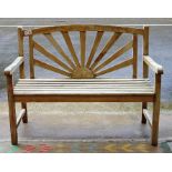 Pair of teak garden benches with 'sunburst'  backs 120 cms w.