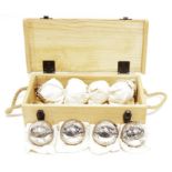 Box set of boules stamped 'Jacques Boule London', in fitted box with rope handles