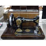 Vintage Jones Family CS sewing machine in wooden carry case