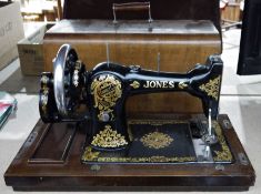Vintage Jones Family CS sewing machine in wooden carry case