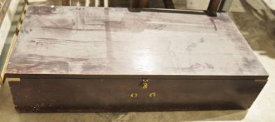 Wooden storage chest lacking brass carry handles, 25cm x 58cm x 103cm