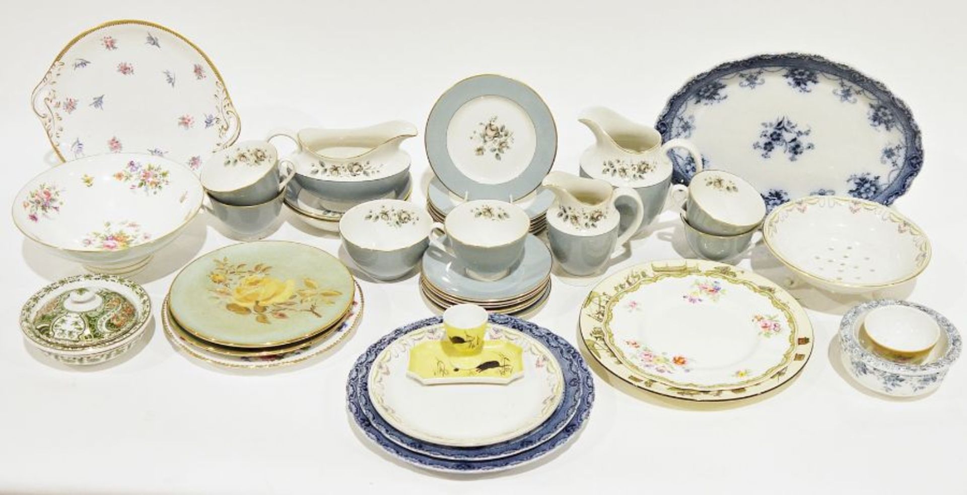 Early 19th century part tea service, roses transfer design on a cream ground, to include tea plates,
