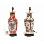Two Oriental-style ceramic table lamps, both on wooden circular stands, 45cm and 43cm high (2)