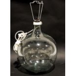 Oversized glass carboy fitted as a lamp