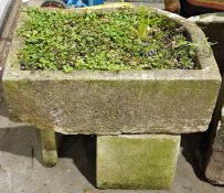 Antique stone trough, with two stone supports 66cms h.