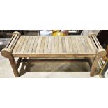 Wooden slatted garden bench with scrolled ends, on four supports, 133cm long x 150cm high