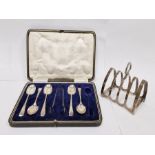 1960's silver toast rack, Sheffield, makers mark T&S and a cased set of 1920's silver teaspoons