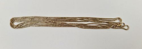 Late Victorian/Edwardian gold-coloured metal guard chain, cylindrical snake-pattern link, 20g