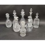 Eight various cut glass engraved decanters, 19th century and later, including two facet cut examples