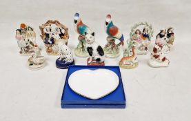 Collection of Staffordshire pottery figures and models of animals, 19th century, including a pair of