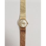 Ladies Eterna-Matic 9ct gold manual wind wristwatch, the circular dial with raised gilt baton