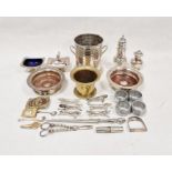 Assorted plated ware to include Viners sugar sifter, napkin rings, knife rests, etc (1 box)