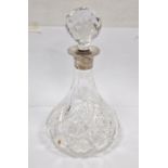 Cut glass ship's decanter of traditional form with silver collar and facet cut ball stopper, 27cm
